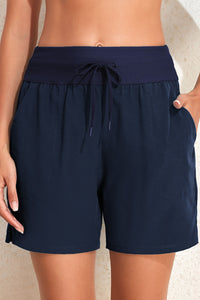 Drawstring Swim Shorts with Pockets - Premium pantalones cortos from Trendsi - Just $27! Shop now at KisLike